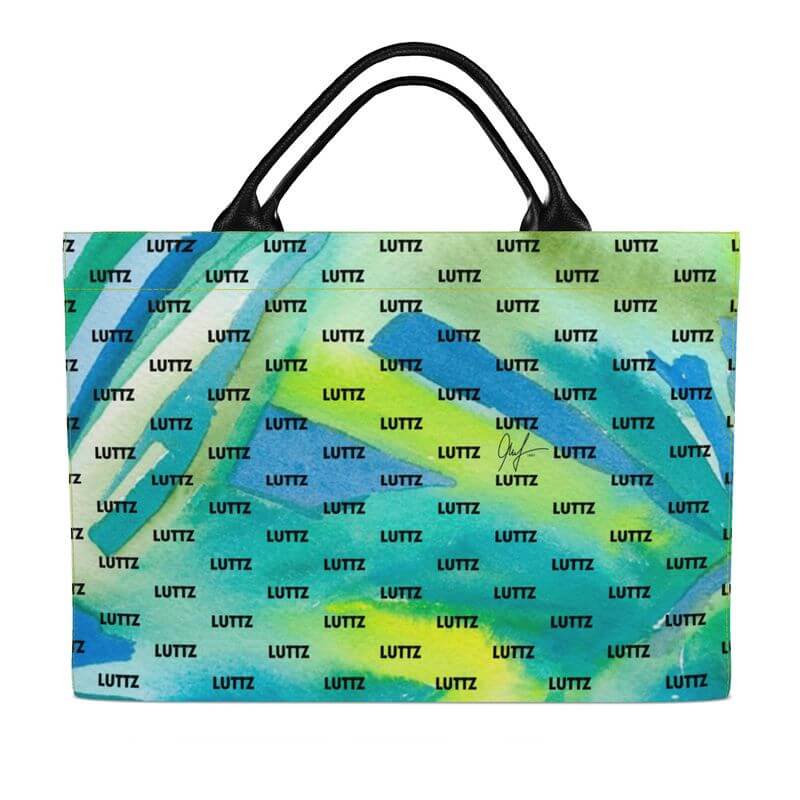 Colorful luxury beach bag from LUTTZ, featuring unique Mediterranean fabric design, inspired by the south of France.