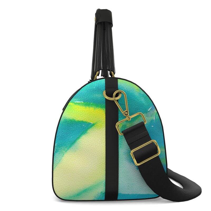 Luxury leather bag with abstract Mediterranean fabric design, inspired by Marseille, showcasing unique artwork.