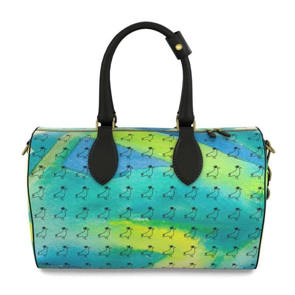 Luxury leather bag featuring abstract Mediterranean fabric design, inspired by Marseille, perfect for travel and shopping.