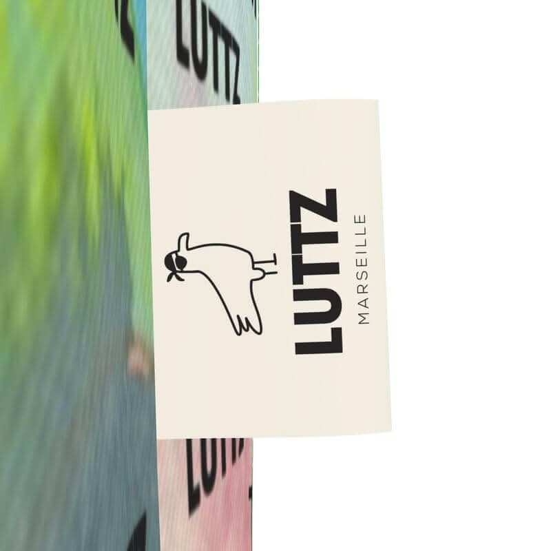 LUTTZ logo on the unique GREEN NOISE bag, a colorful designer piece inspired by Mediterranean fabric from Marseille.