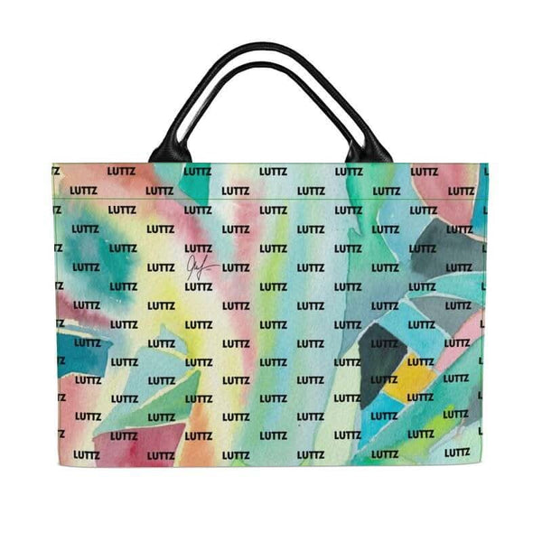 Colorful BIG bag from LUTTZ's UNIQUA series, featuring a Mediterranean fabric design and leather handles.
