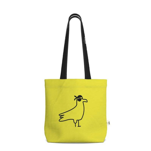 LEMON SKIN tote bag by LUTTZ, a unique luxury design in yellow with an original bird artwork, inspired by Mediterranean style.