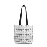 Elegant black and white tote bag from LUTTZ featuring unique fabric design, minimalist style, and inspired by the South of France.