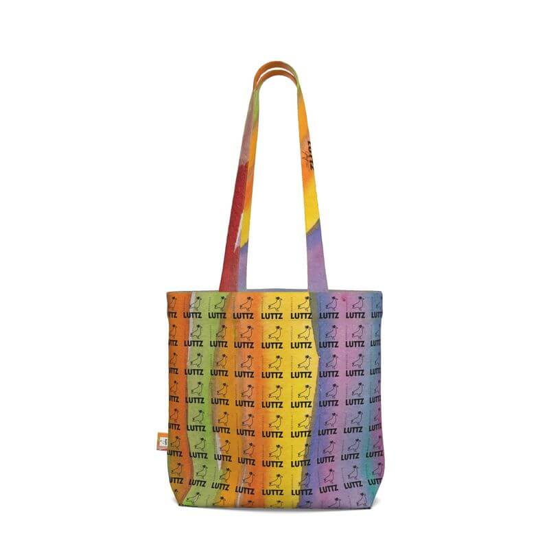 Luxury tote bag by LUTTZ, showcasing unique Mediterranean fabric design inspired by South of France, like an artwork.