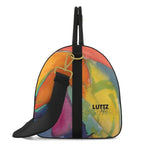 Luxury UNIQUA Traveller leather bag by LUTTZ, featuring an abstract painting design, a unique art object for travelers.