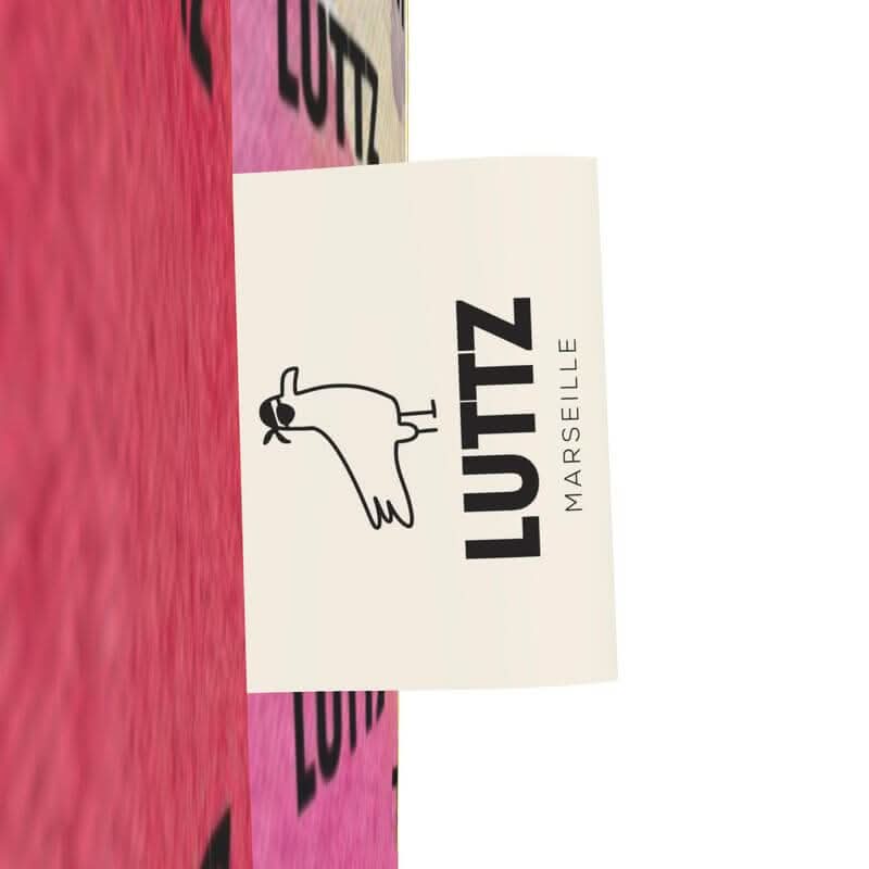 LUTTZ Marseille label on colorful multi-purpose bag, showcasing unique Mediterranean design and luxury craftsmanship.