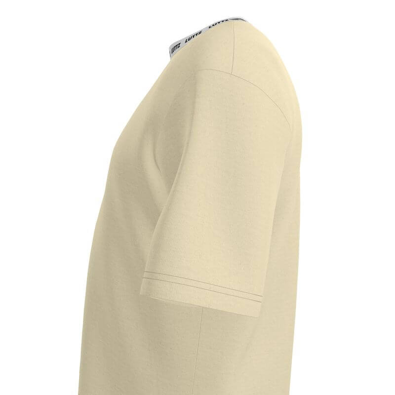 Side view of the OVERSIZE T-SHIRT by LUTTZ in cream, showcasing its casual cut and unique design.