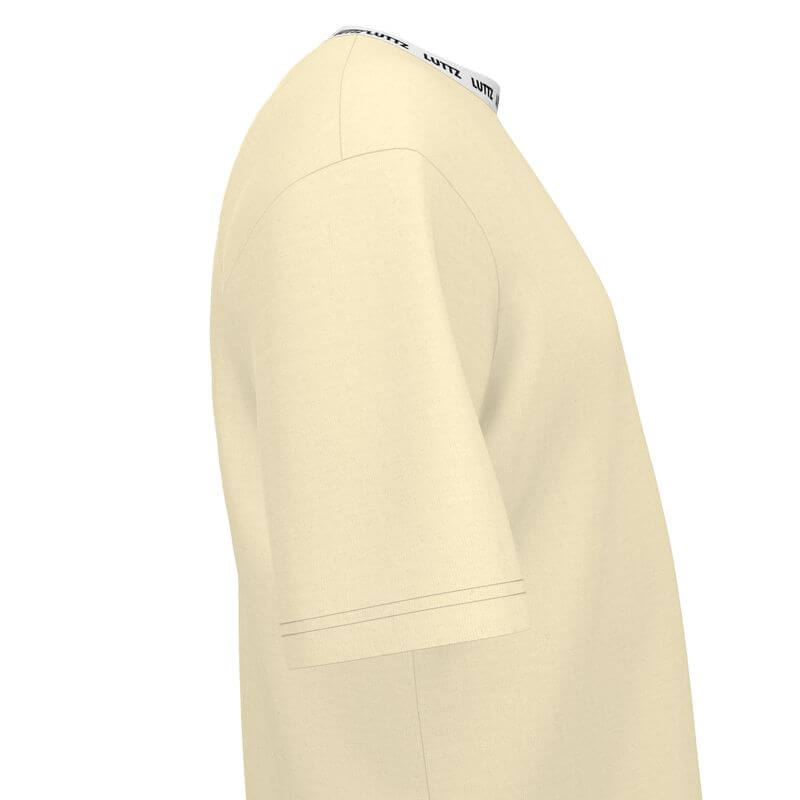 Side view of the OVERSIZE T-SHIRT by LUTTZ in cream color, showcasing its casual cut and unique design.
