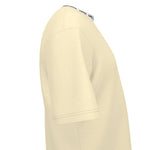 Side view of the OVERSIZE T-SHIRT by LUTTZ in cream color, showcasing its casual cut and unique design.