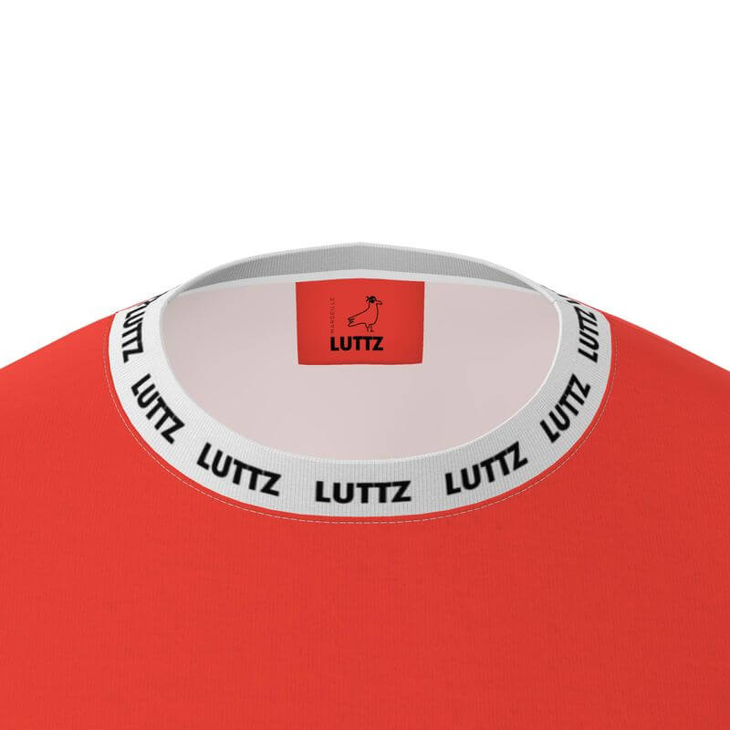 Close-up of LUZZ oversized t-shirt collar showcasing luxury minimalistic design with exclusive branding and vibrant red color.
