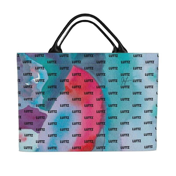 Luxury pink blush bag by LUTTZ, featuring a unique Mediterranean design and leather handles, perfect for beach outings.