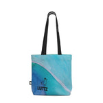 Luxury SEA SLIDE tote bag by LUTTZ, featuring an exceptional abstract painting design in blue tones.