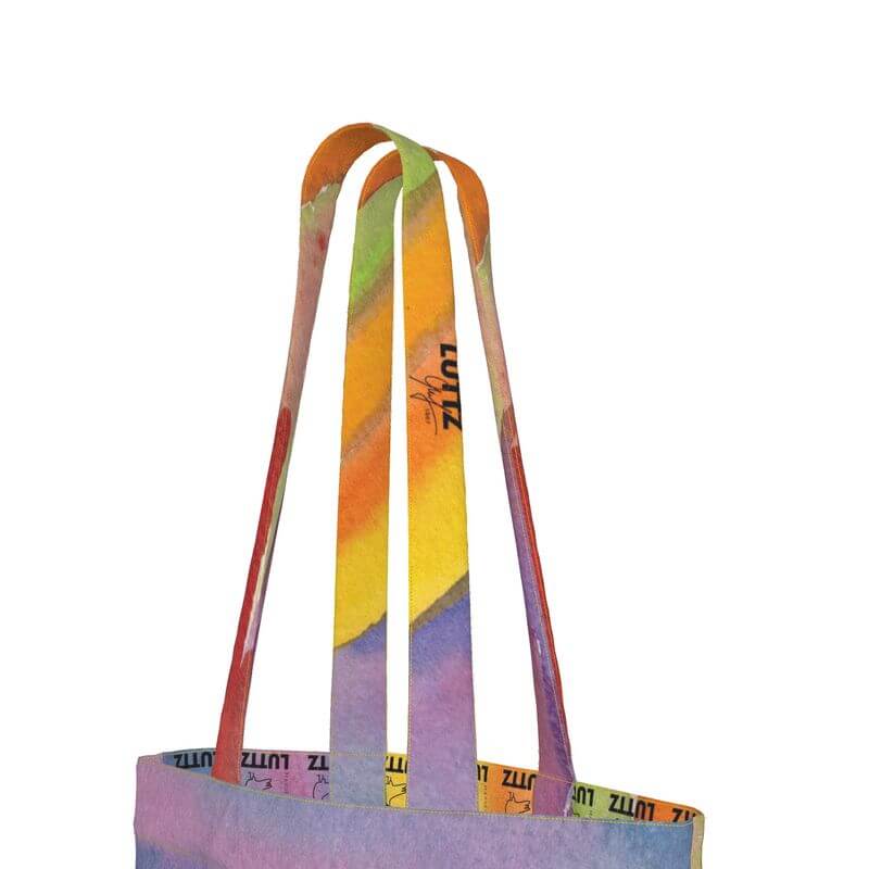 Colorful straps of the UNIQUA tote bag by LUTTZ, showcasing a unique Mediterranean fabric design.