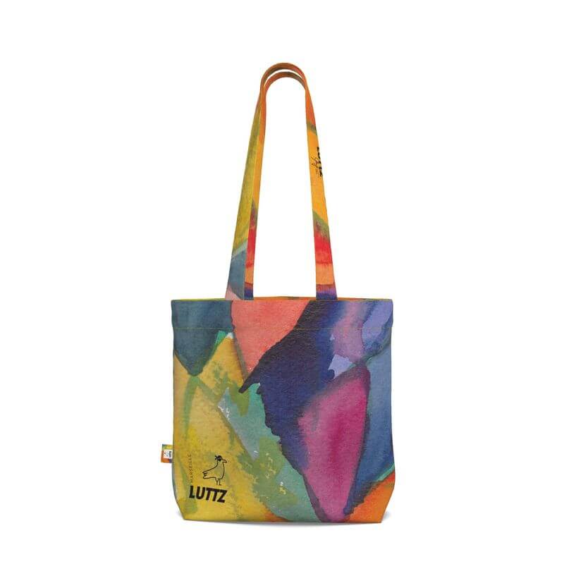 Colorful UNIQUA tote bag by LUTTZ, luxury designer piece with unique Mediterranean fabric design inspired by Marseille.