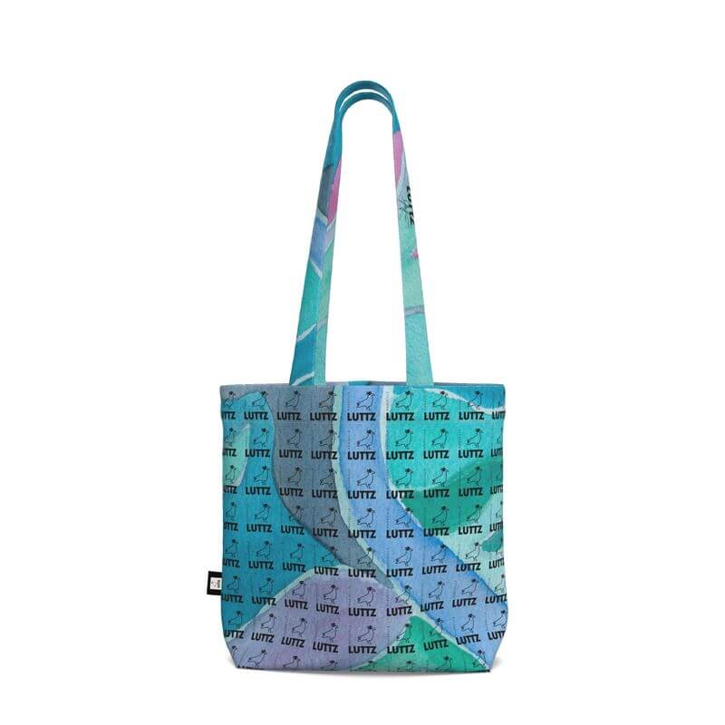 Luxury tote bag from LUTTZ featuring a unique Mediterranean fabric design, inspired by the south of France.