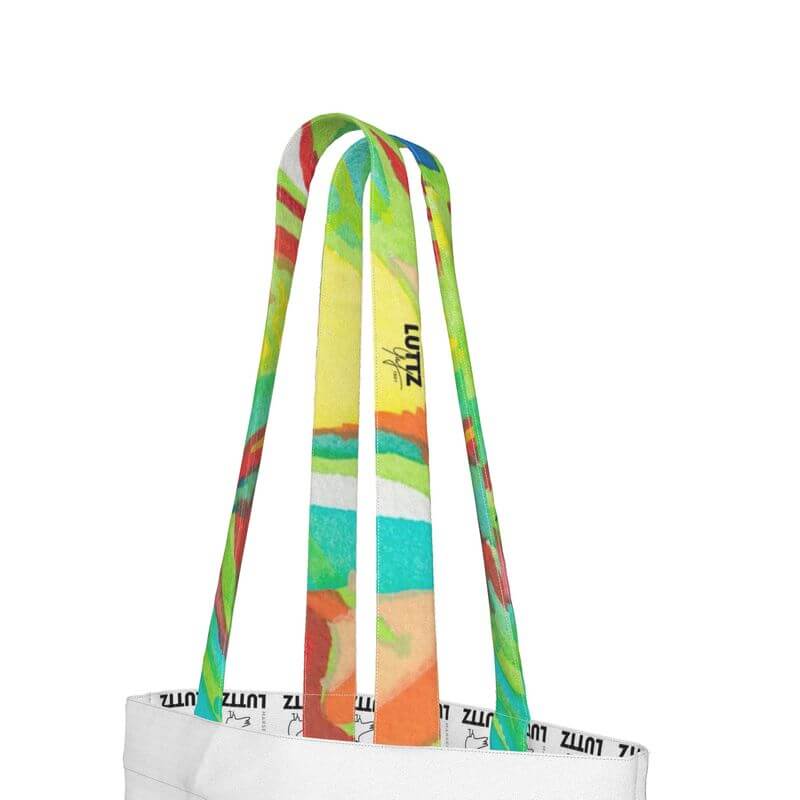 Colorful straps of the UNIQUA classic tote bag by LUTTZ in 100% cotton denim, showcasing vibrant design for everyday use.
