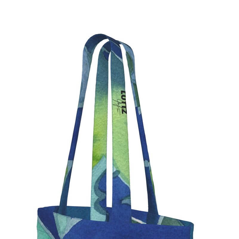 Luxury designer tote bag by LUTTZ in green and blue, featuring an original Mediterranean fabric design.