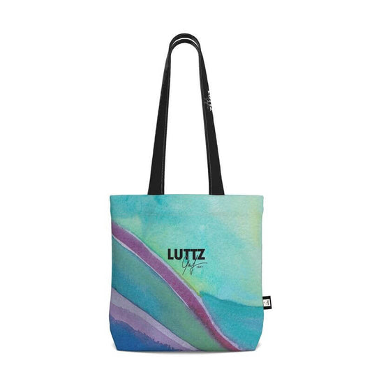Luxury SEA SLIDE tote bag by LUTTZ, featuring unique abstract painting design inspired by the South of France.