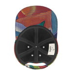 Unique designer baseball cap with Mediterranean fabric design, inspired by Marseille, resembling abstract artwork.