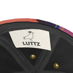 LUTTZ Marseille logo inside a unique handcrafted baseball cap with Mediterranean fabric design, part of Urban Trendsetter series.