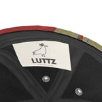 Inside view of LUTTZ baseball cap showcasing unique Mediterranean fabric design from Marseille.