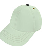 Luxury olive baseball cap from LUTTZ, handcrafted with unique design inspired by abstract art.