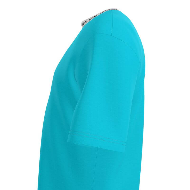 Side view of the SKY ENERGY OVERSIZE T-SHIRT by LUTTZ, showcasing its vibrant turquoise color and casual design.