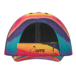 Unique luxury LUTTZ baseball cap with Mediterranean fabric design, vibrant colors inspired by the south of France.