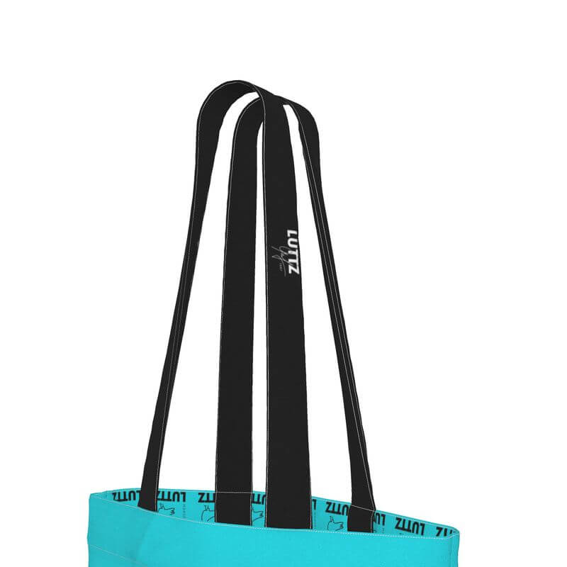 Turquoise tote bag straps by LUTTZ, showcasing a minimalist and elegant design from Marseille.