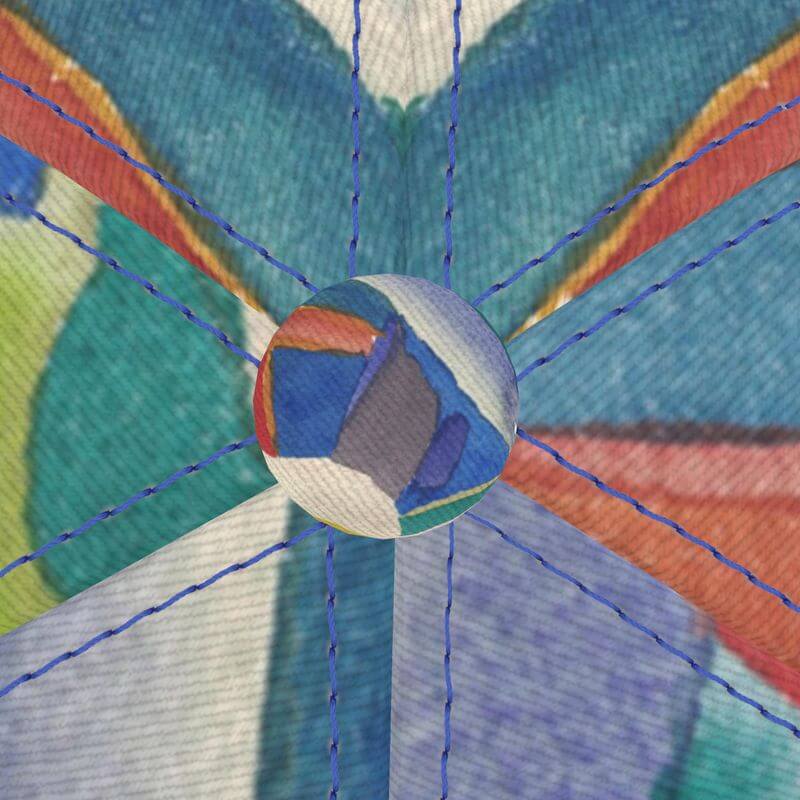 Close-up of unique luxury baseball cap panel, showcasing Mediterranean-inspired fabric design, a designer piece from Marseille.