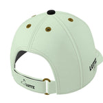 Back view of a unique luxury baseball cap by LUTTZ, featuring gold eyelets and an adjustable strap, resembling an art object.