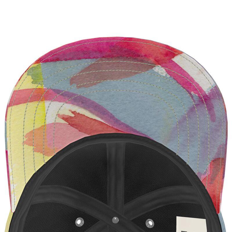 Unique designer baseball cap with Mediterranean fabric design, inspired by the south of France, like an abstract artwork.