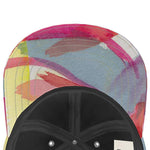 Unique designer baseball cap with Mediterranean fabric design, inspired by the south of France, like an abstract artwork.