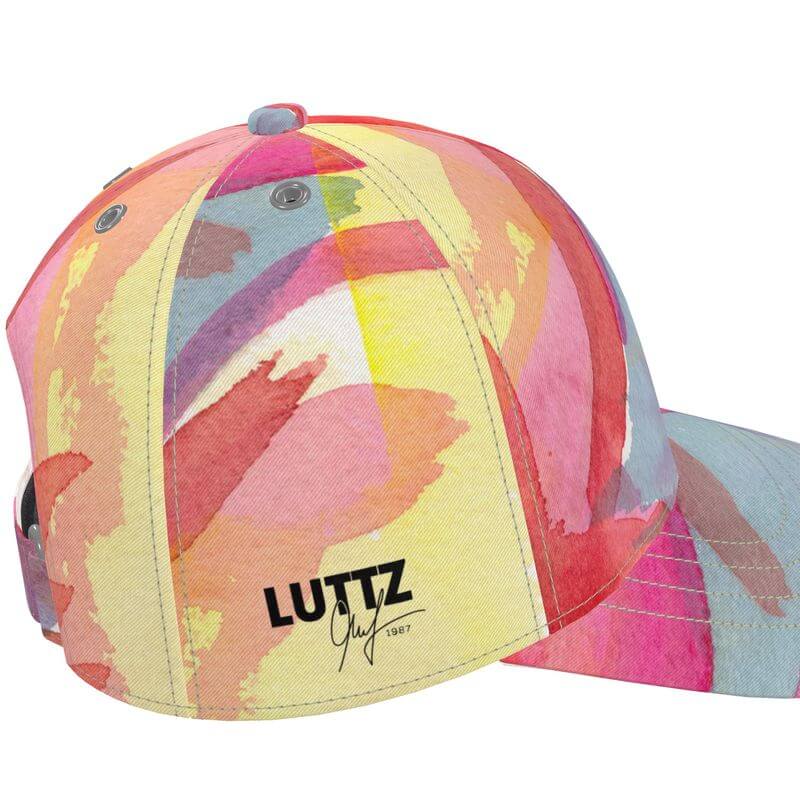 Luxury LUTTZ baseball cap with unique Mediterranean fabric design, inspired by the south of France, in vibrant abstract colors.